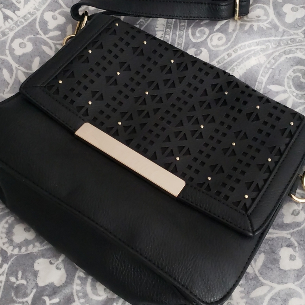 Black purse with laser cut details